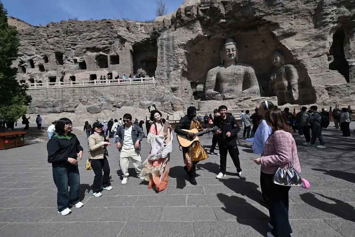 云冈研究院文物保护_云冈石窟保护研究_云冈大佛都被山西消防喊来上班
