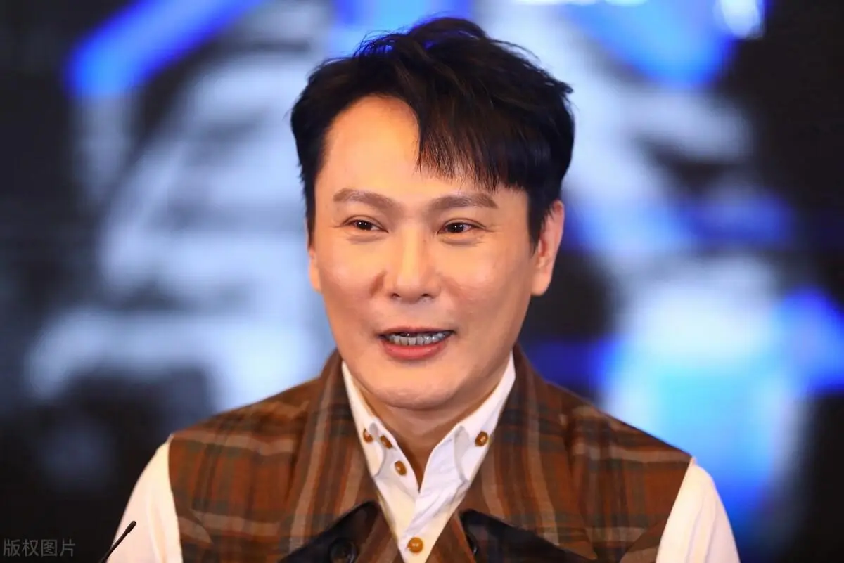 张信哲朱小妹照片_张信哲情歌教主爱情故事_张信哲感情经历