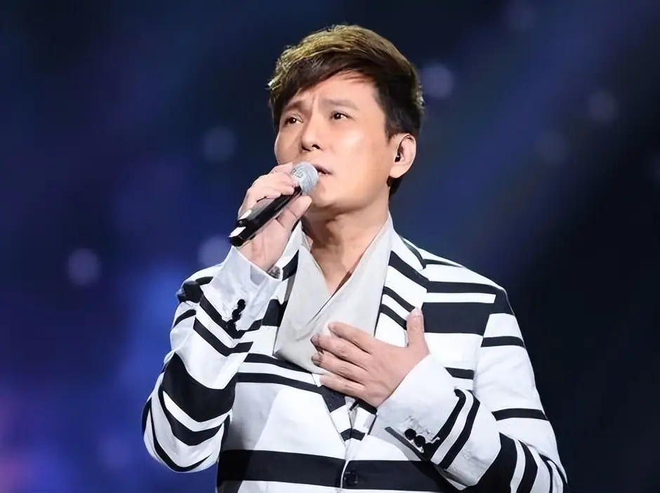 张信哲感情经历_张信哲朱小妹照片_张信哲情歌教主爱情故事