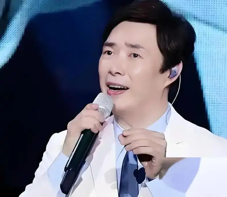 选择单身的明星_张信哲朱小妹照片_张信哲单身原因