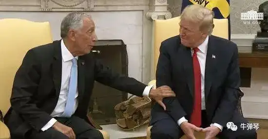 特朗普握手技巧_特朗普马克龙26秒“掰手腕式握手”_破解特朗普握手神功