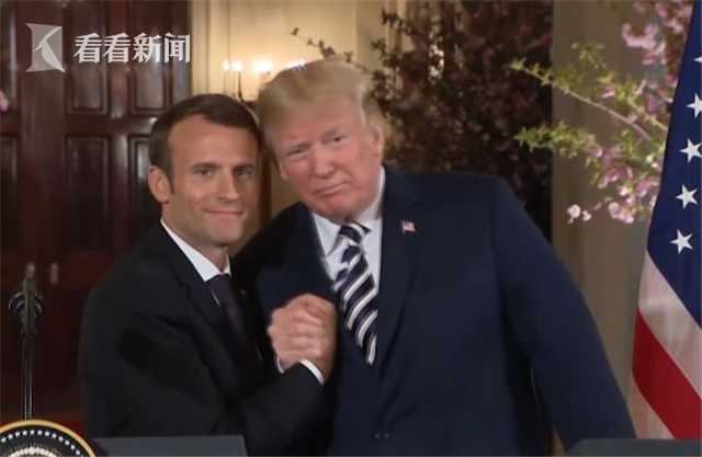 G7峰会 马克龙 特朗普 关系紧张_特朗普马克龙26秒“掰手腕式握手”_G7峰会 两国贸易争端 马克龙推文