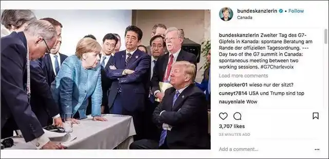 特朗普马克龙握手_特朗普马克龙26秒“掰手腕式握手”_特朗普握手特点