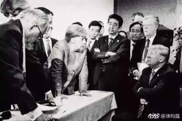 特朗普马克龙握手_特朗普握手特点_特朗普马克龙26秒“掰手腕式握手”