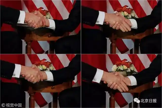 特朗普握手特点_特朗普马克龙握手_特朗普马克龙26秒“掰手腕式握手”