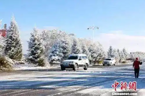 北京今晨降雪_广州市气象局回应_南方还在吹空调 北方已经下雪了