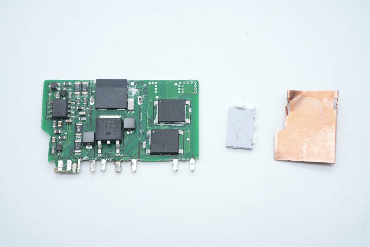 氮化镓电源适配器内部方案和用料_联想原装100W氮化镓电源适配器拆解_联想电脑电源线通用吗